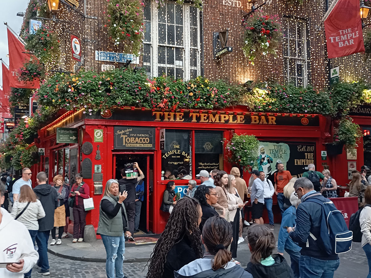 Exploring the vibrant streets and colorful shopfronts of Temple Bar in Dublin with Dublin Walkabout Tours.