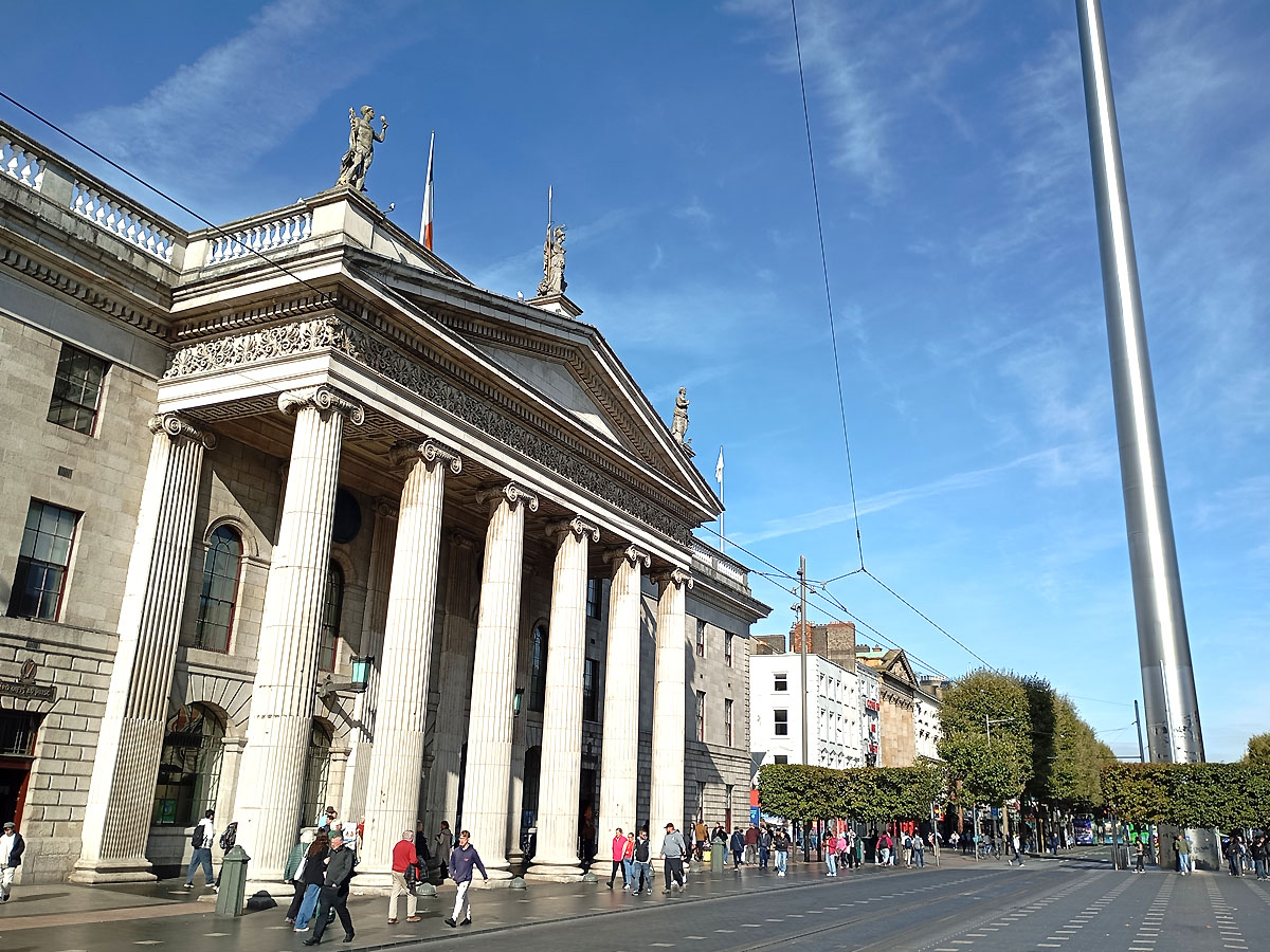 Looking down O'Connell Street at the GPO and the Spire with Dublin Walkabout Tours.