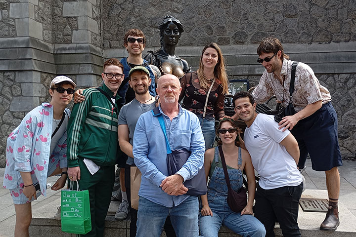 Tourists at the Molly Malone statue in Dublin with private tour guide David