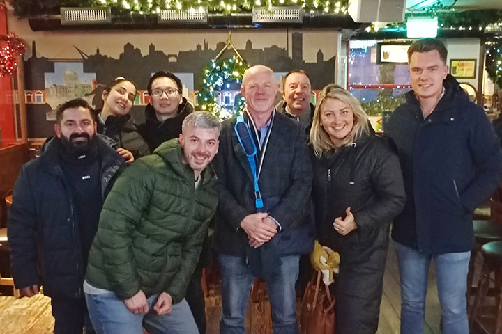Company group inside Darky Kelly's Pub with Dublin guide David during a private walking tour
