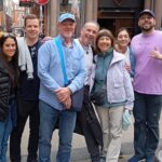 On a Dublin Private Walking Tour, local guide David poses with his guests on Dame Lane Dublin