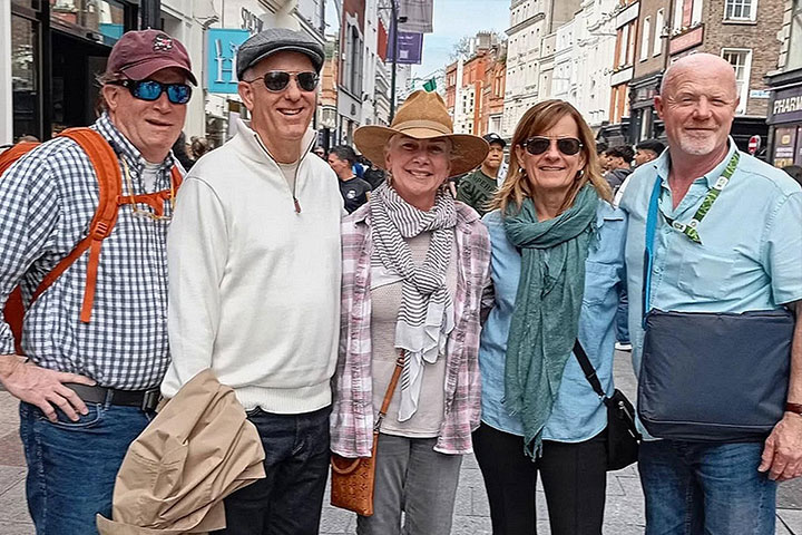 Guests walking down Grafton Street with their guide during a private tour