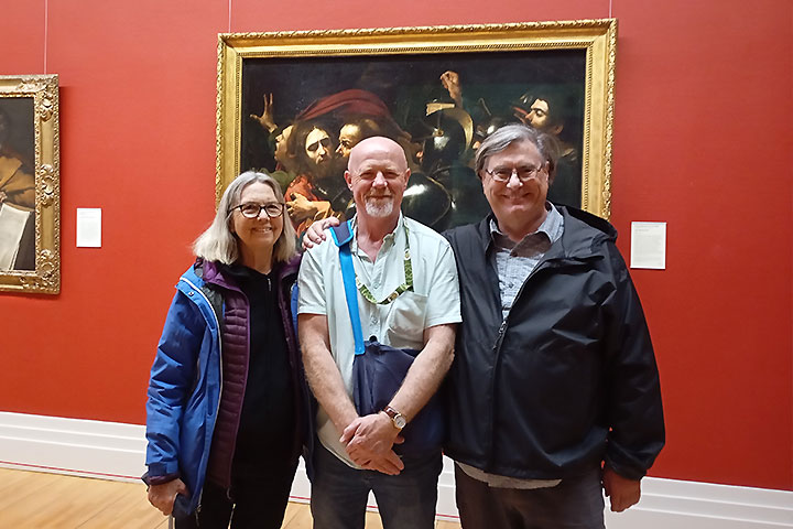 Tour group viewing Carravaggio’s 'The Taking of Christ' with local guide David on a private tour at the National Gallery of Ireland